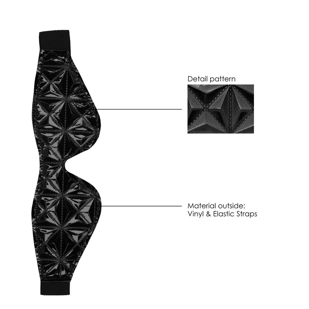 Close-up of a plush black eye mask with a smooth, luxurious finish, designed for restful sleep.
