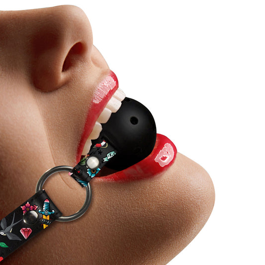 Shots Toys ouch ball gag with breathable holes and black printed leather straps.