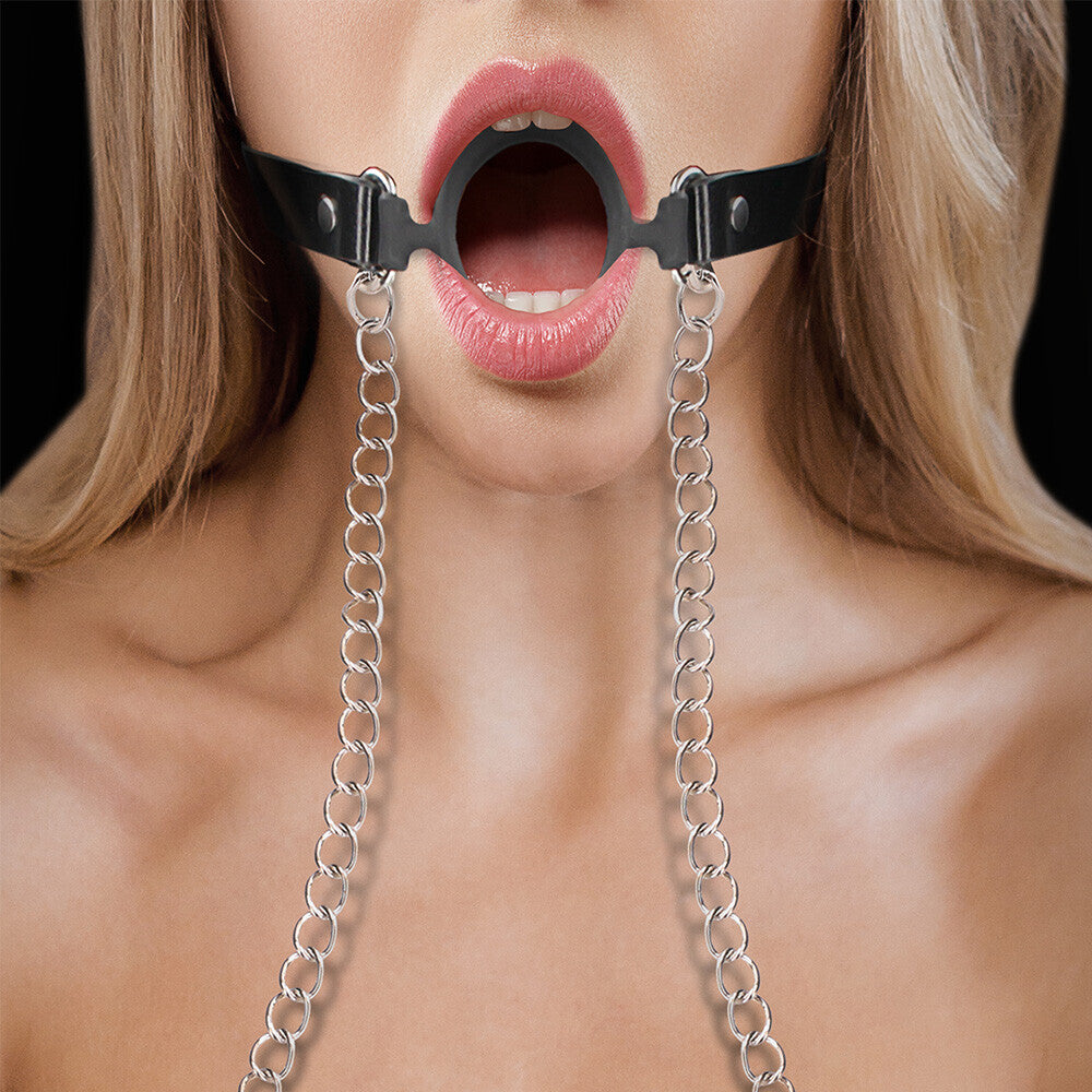 Black o ring gag with silver nipple clamps, a kinky restraint from shots toys.
