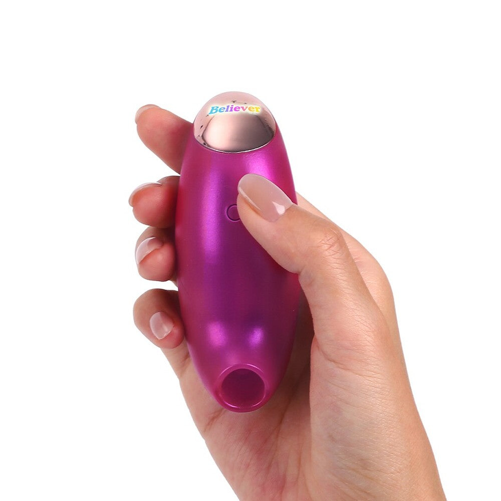 Close-up of the Love to Love Believer clitoral vibrator in a smooth, purple finish.