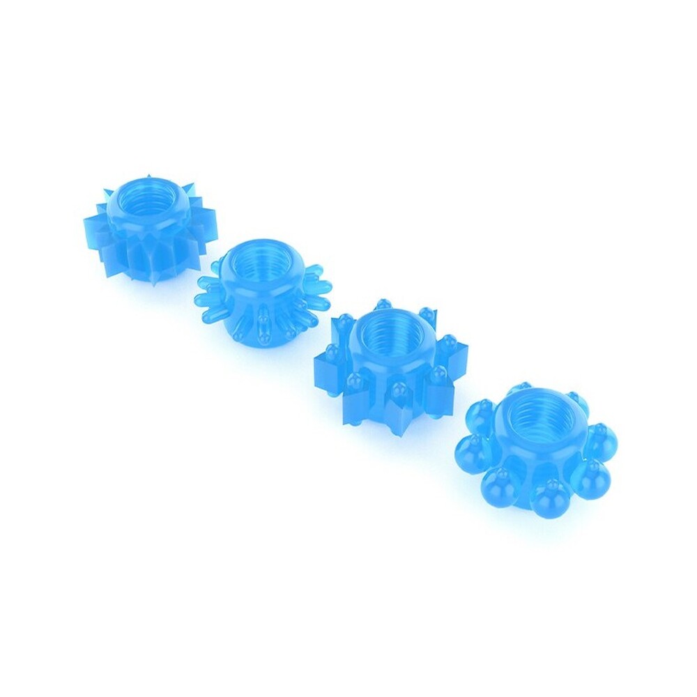 Four glow-in-the-dark cock rings for enhancing pleasure and extending intimacy, made of smooth material.