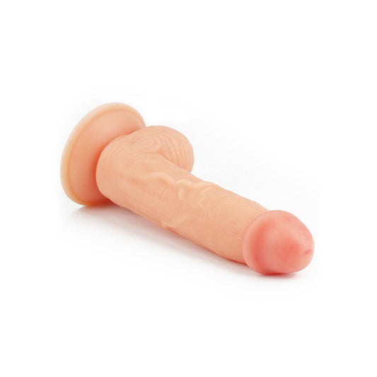 Close-up of an ultra-soft, realistic 8-inch dildo, fleshy colour, smooth finish. A realistic toy.