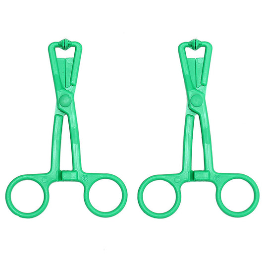 A pair of green scissor nipple clamps with a shiny metal chain, by rimba.