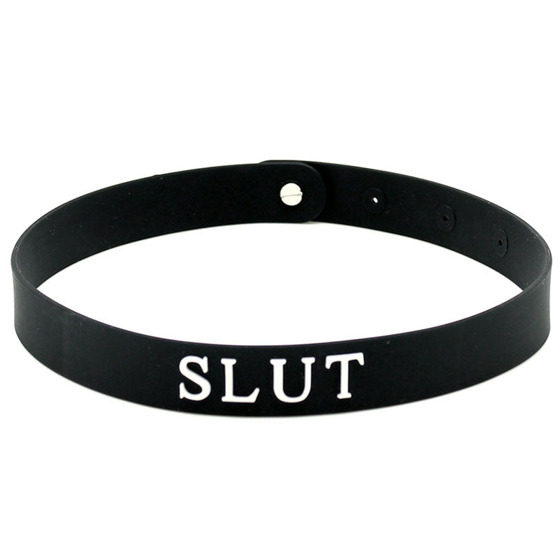 Close-up on a sleek black silicone collar, a kinky accessory from rimba, perfect for playful nights.
