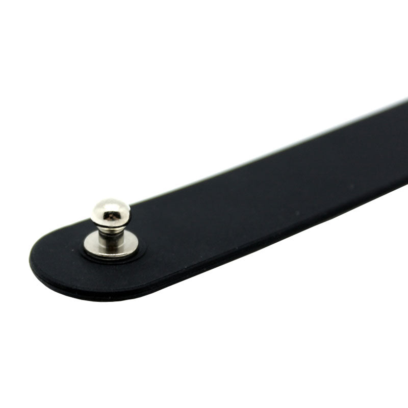 Close-up of a black silicone collar; a kinky, edgy accessory from Rimba.