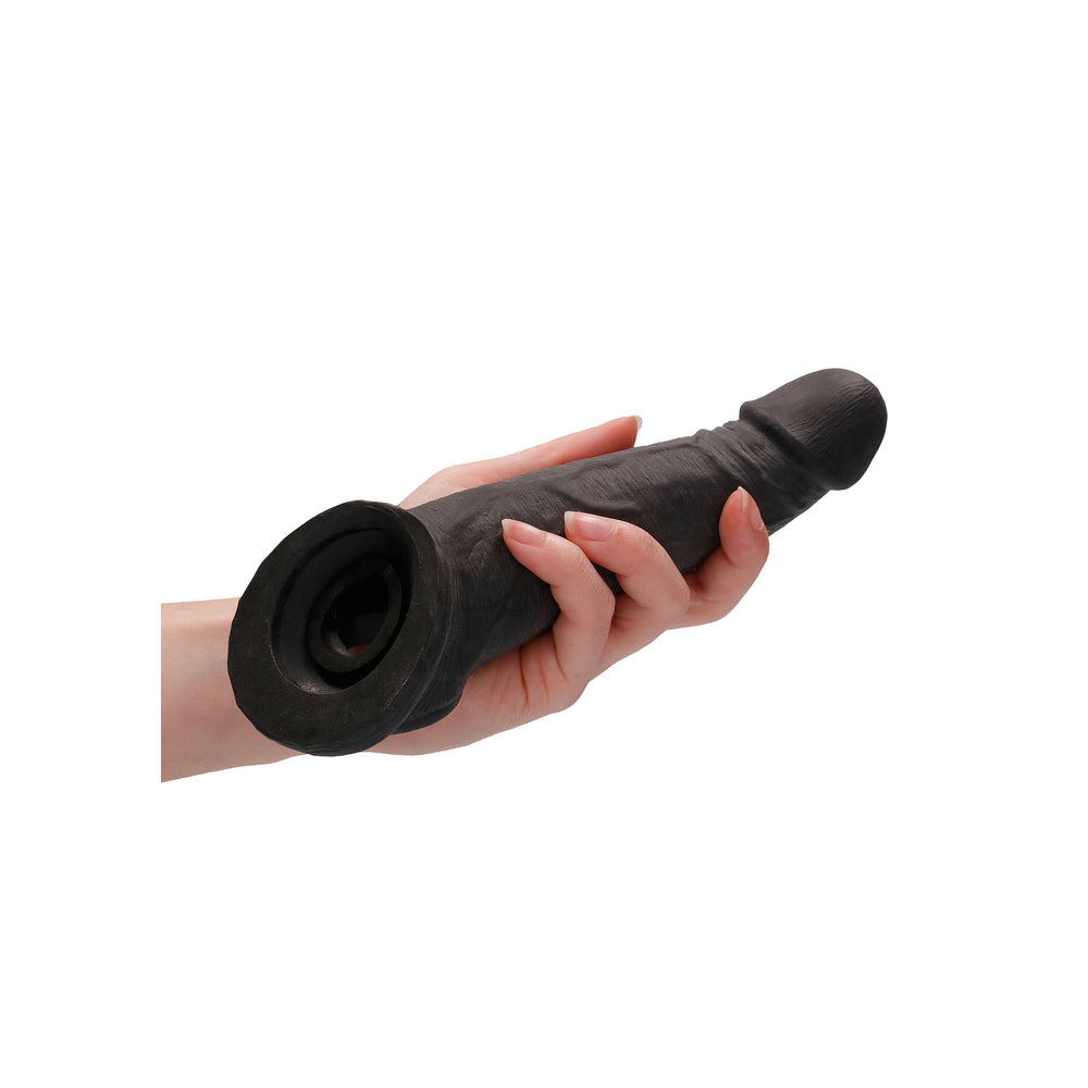 Black 8 inch penis sleeve, a reusable toy designed for enhanced pleasure and comfort.