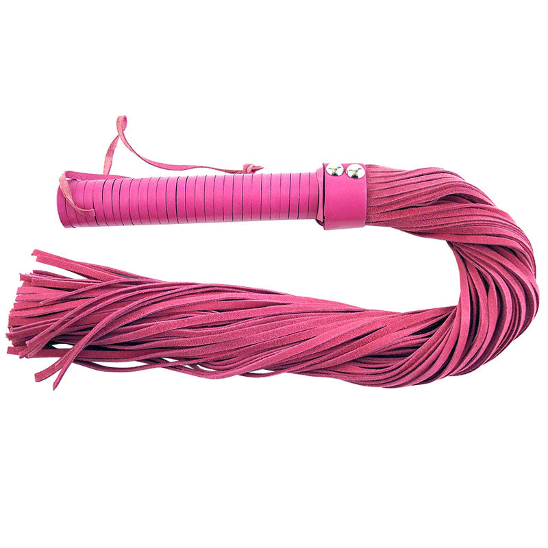 Close-up of a pink suede flogger from rouge garments, a playful and tactile accessory.