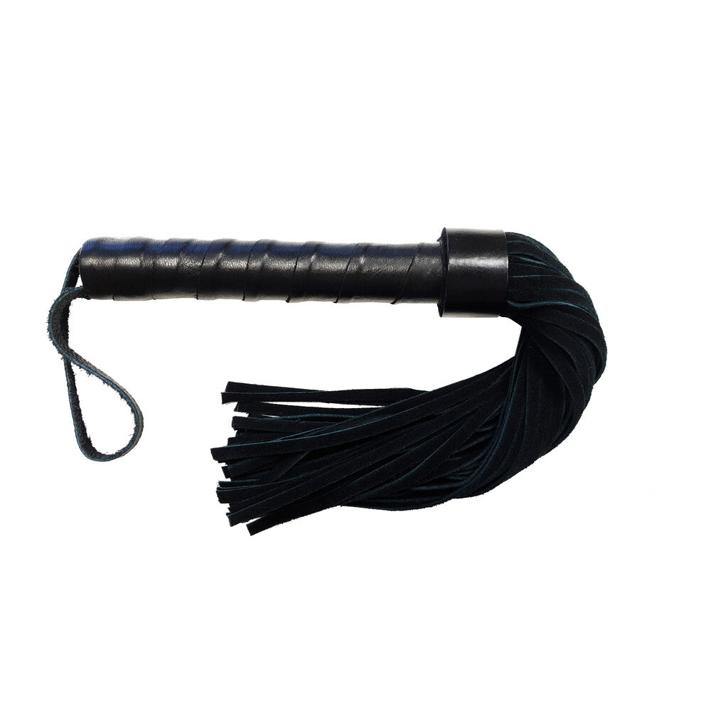 rouge leather handle suede flogger whip for playful sensual activities, photographed up close.