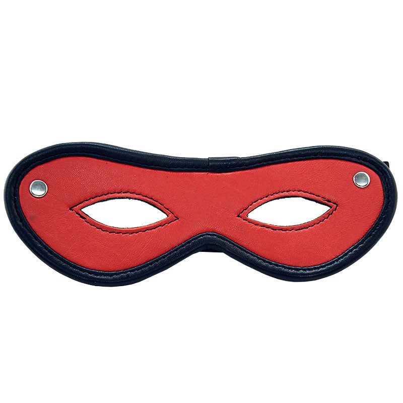 A red, open-eye sleep mask from Rouge Garments, for blocking light while resting.