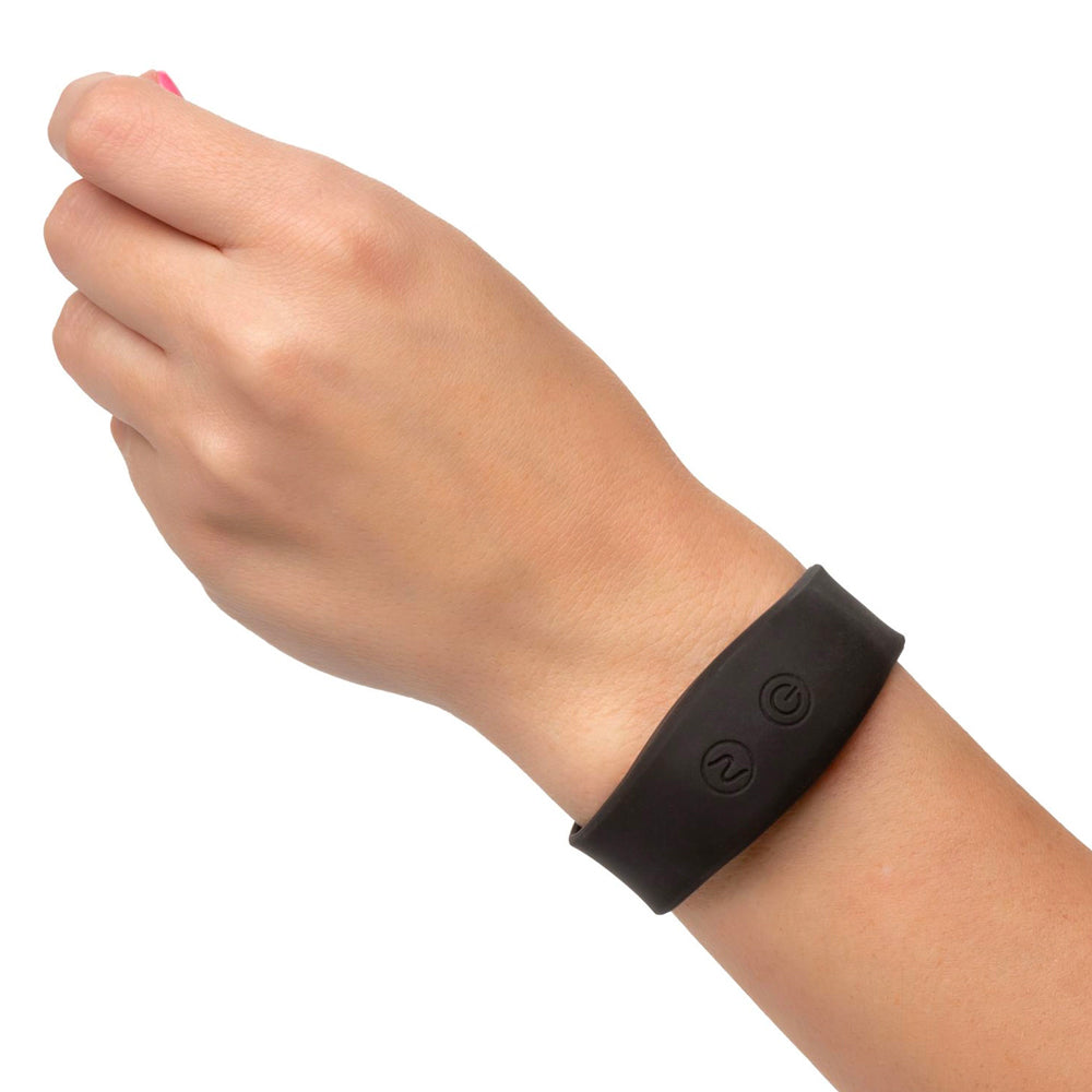 Petite bullet vibrator in a sleek design, with a rechargeable wristband remote for hands-free fun.