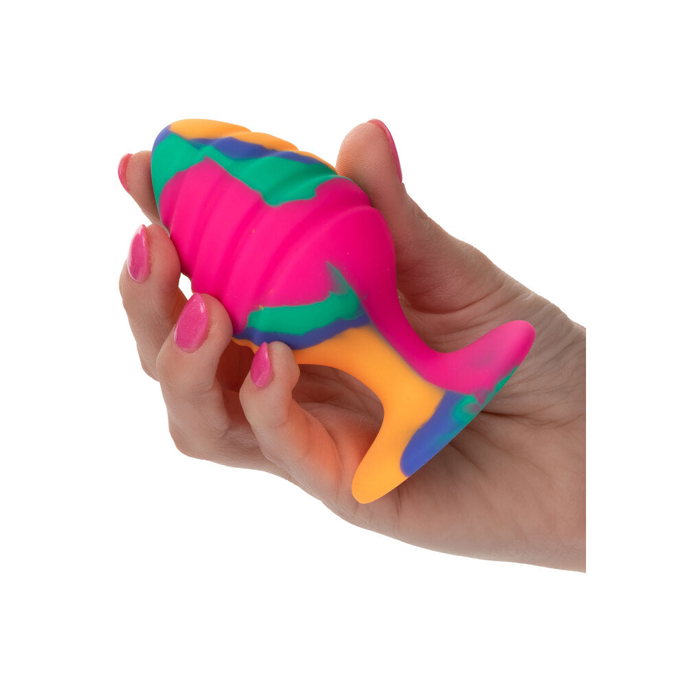 Cheeky large butt plug with a groovy, colourful swirl tie-dye pattern for anal pleasure.