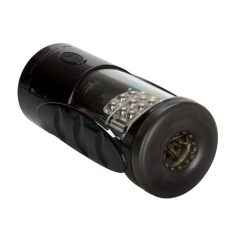 California Exotic vibrating masturbator in a sleek, dark finish, part of the Optimum Series.