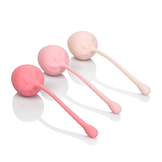 Strawberry-coloured kegel exercise set for strengthening pelvic floor muscles, presented by California Exotic.