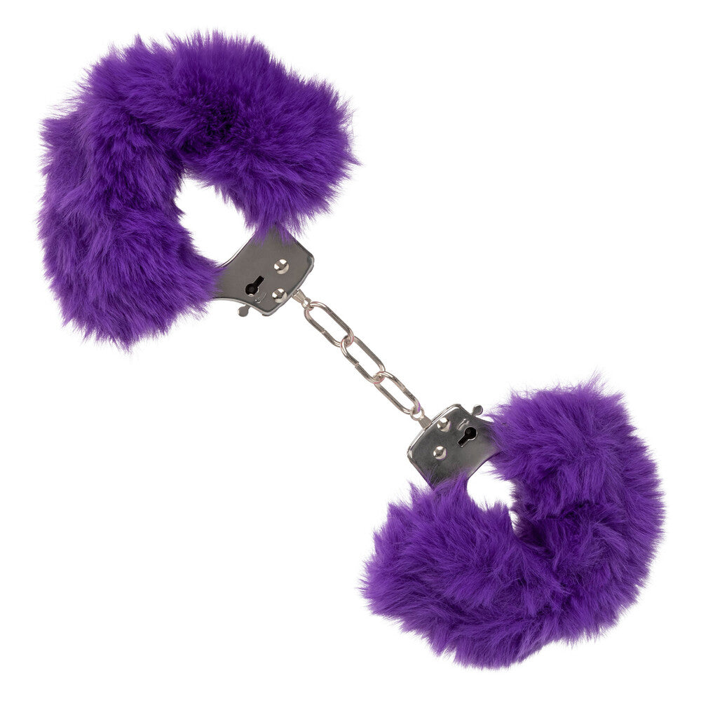 Purple furry handcuffs, ultra fluffy and soft, a playful accessory for adult fun.