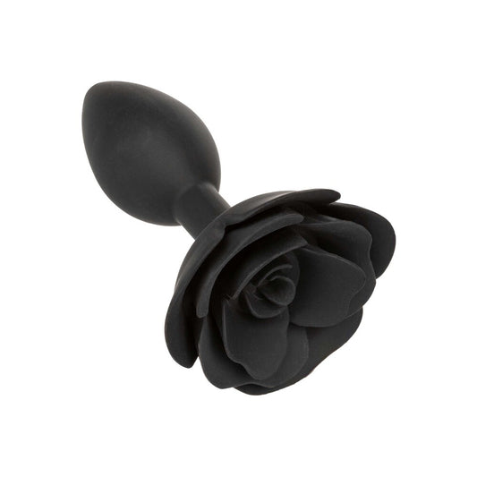 Large rose-shaped anal plug in a seductive dusky pink, crafted for forbidden pleasures.