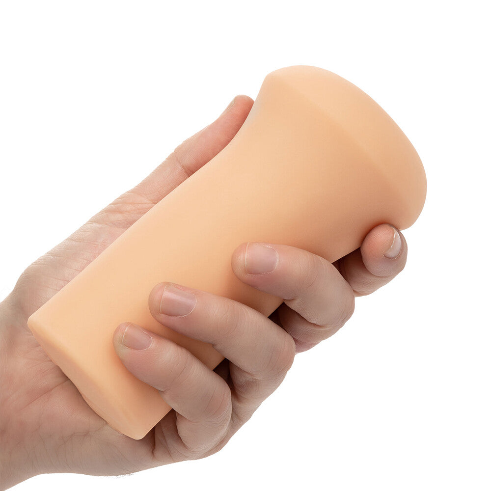 Flesh pink stroker masturbator from california exotic, for solo adult fun.