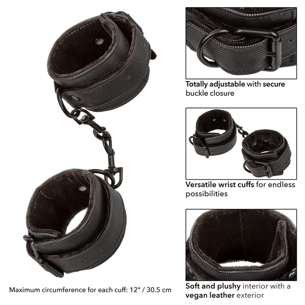 Silver metal wrist restraints with a hinged design for playful bondage adventures.