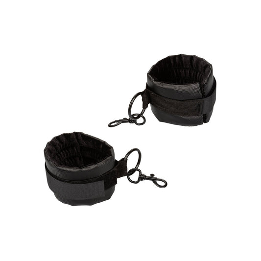 Black leather collar body restraint with adjustable straps for kinky bedroom adventures.