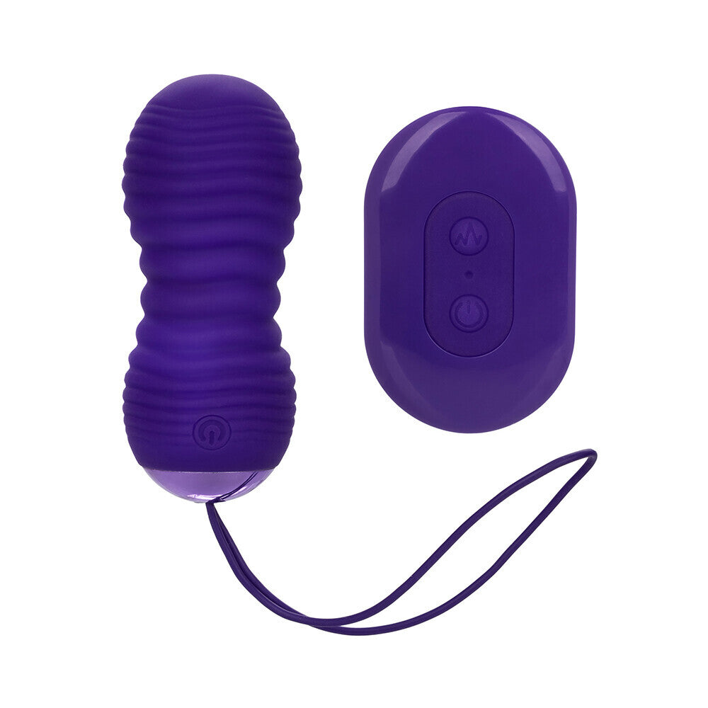 Ribbed bullet vibe with remote control, in a muted tone, for intimate pleasure.