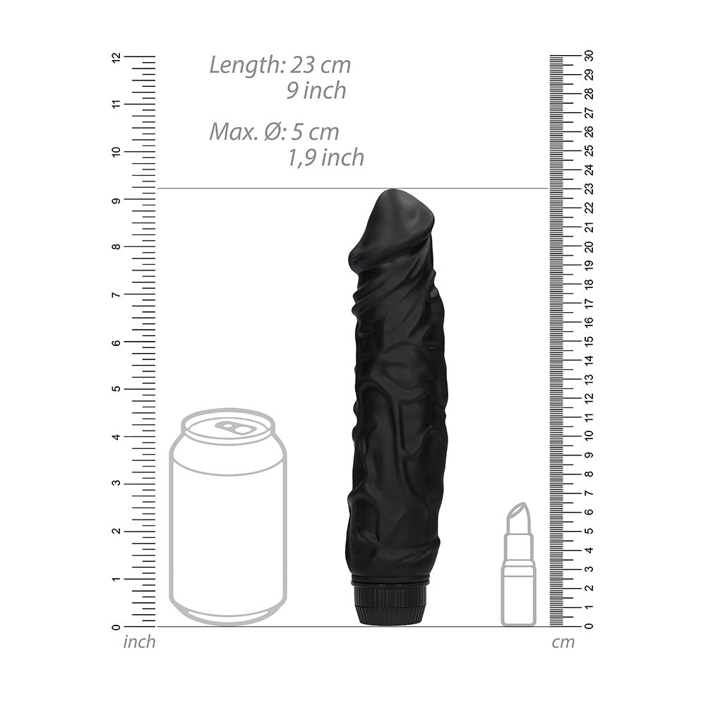 Black realistic penis vibrator from shots toys, made from smooth, skin-safe material for intimate pleasure.