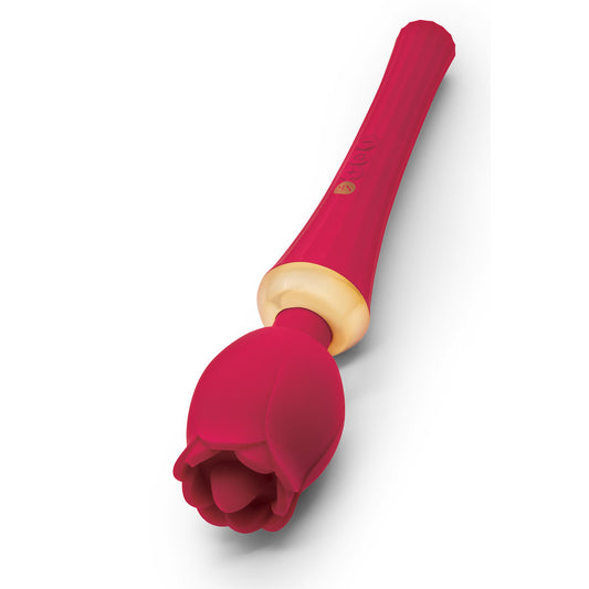 Close-up of a rose-shaped wand massager attachment, soft pink with a smooth finish.