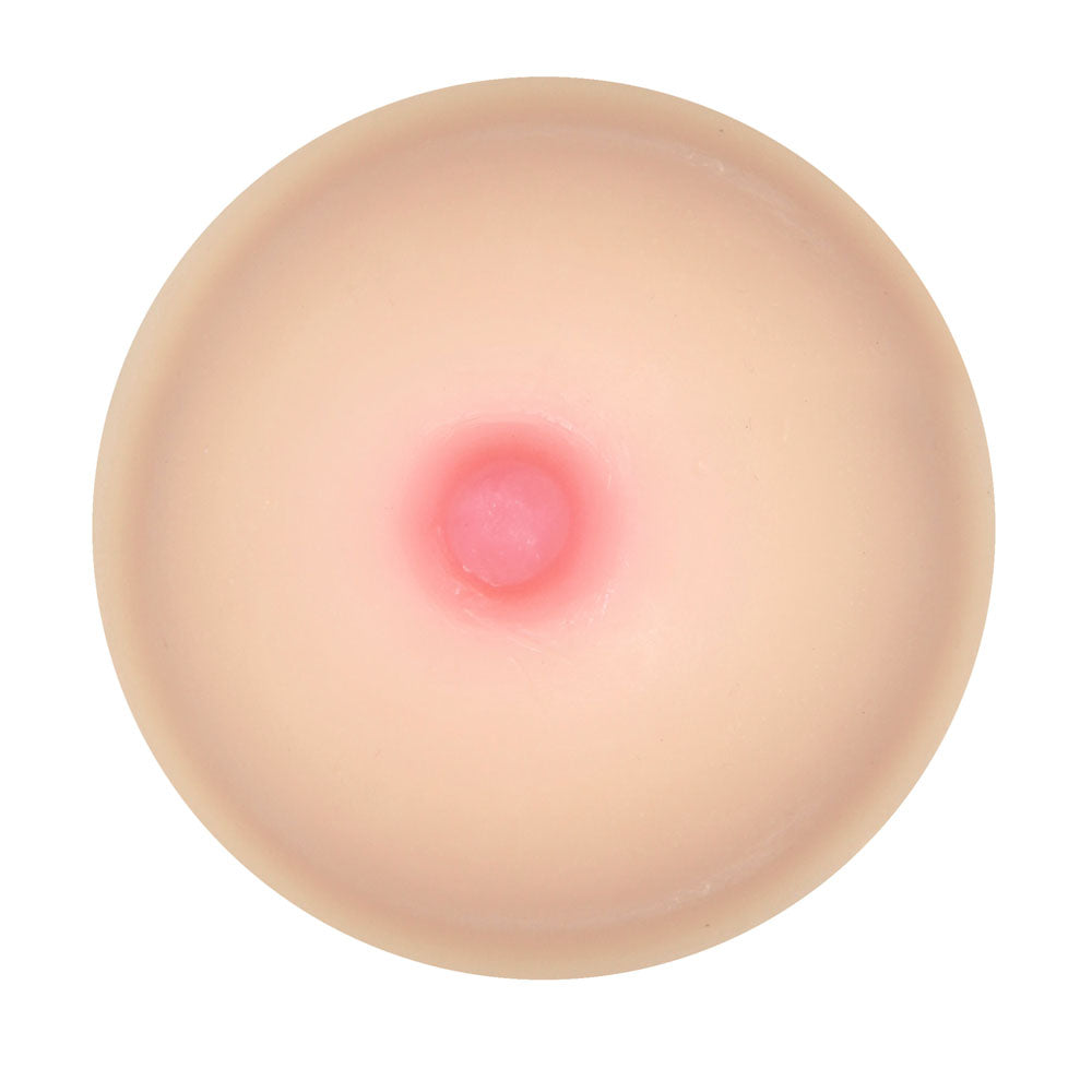 Novelty pink titty-shaped soap bar from Shots Toys, a fun and cheeky bathing novelty.