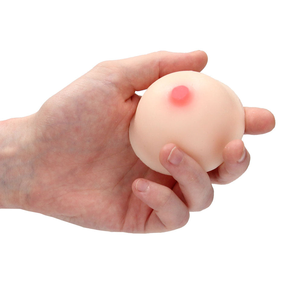 A pink novelty soap shaped like a breast, from shots toys, a fun novelty.