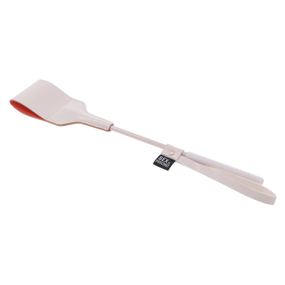 Sportsheets sex and mischief riding crop, a black faux-leather whip for playful fun.