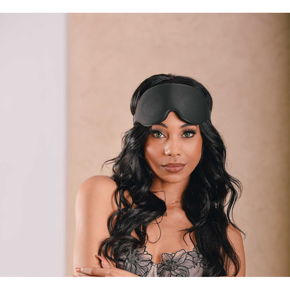Black blackout blindfold from Sportsheets, made of soft fabric, for enhanced sensory deprivation.