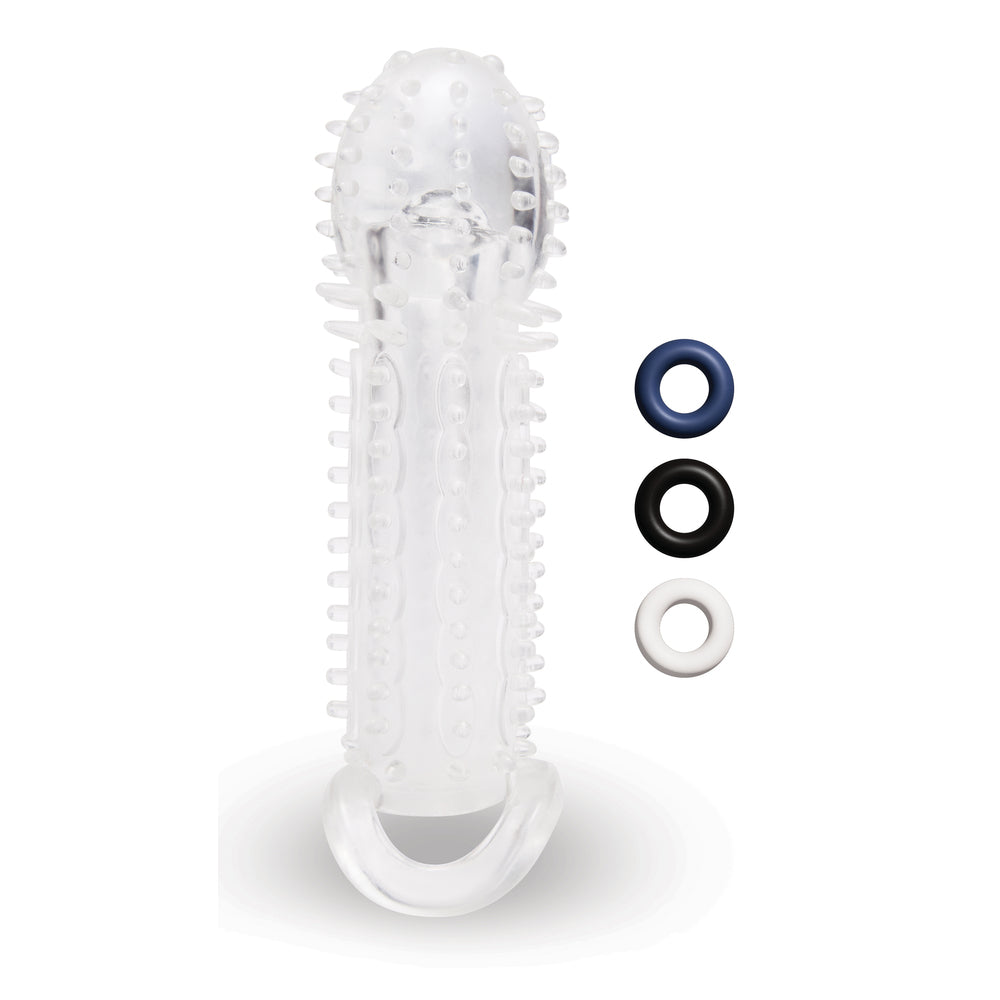 Close-up of a clear, textured 1.5 inch penis extender, a Size Up accessory for discreet use.