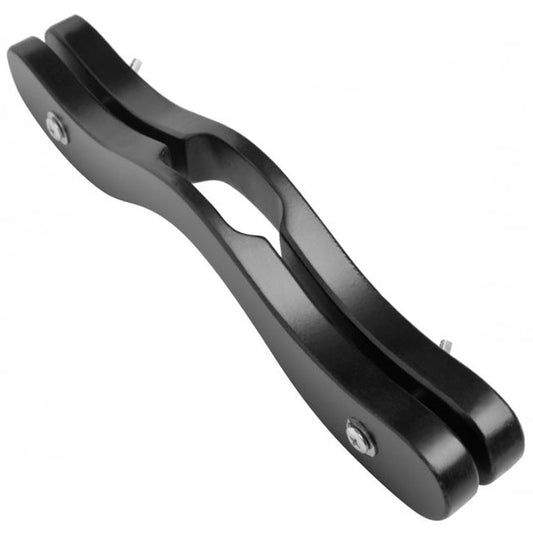 master series the enforcer, a black wooden male chastity device, showcasing intricate details.