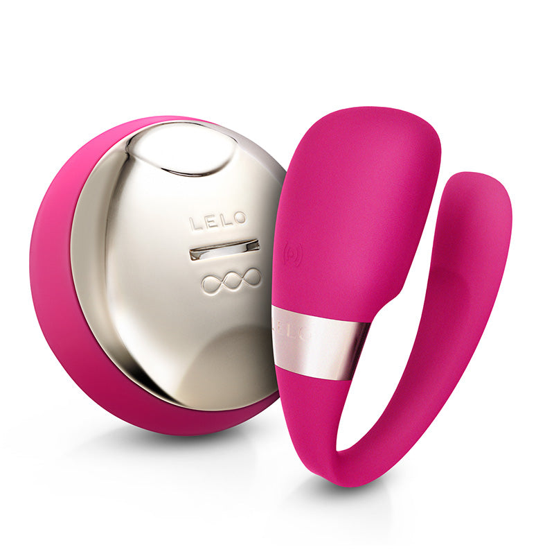 Cerise-coloured Lelo Tiani 3 rechargeable couple's massager with a smooth, luxurious finish, ideal for intimate pleasure.