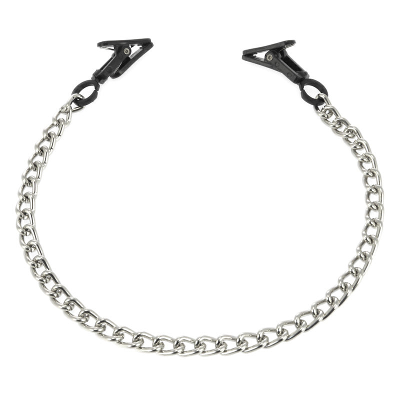 Small, silver-tone metal Rimba nipple clamps, used for erotic nipple play and sensation.