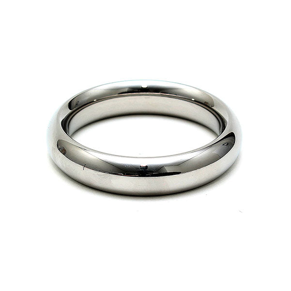 A metallic, smooth-finished cock ring made of metal for enhancing bondage play.