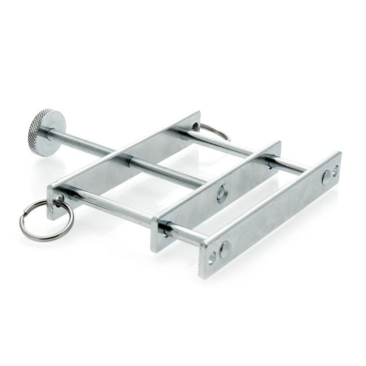 Rimba metal cock and ball crusher for bondage, a shiny, robust-looking device.