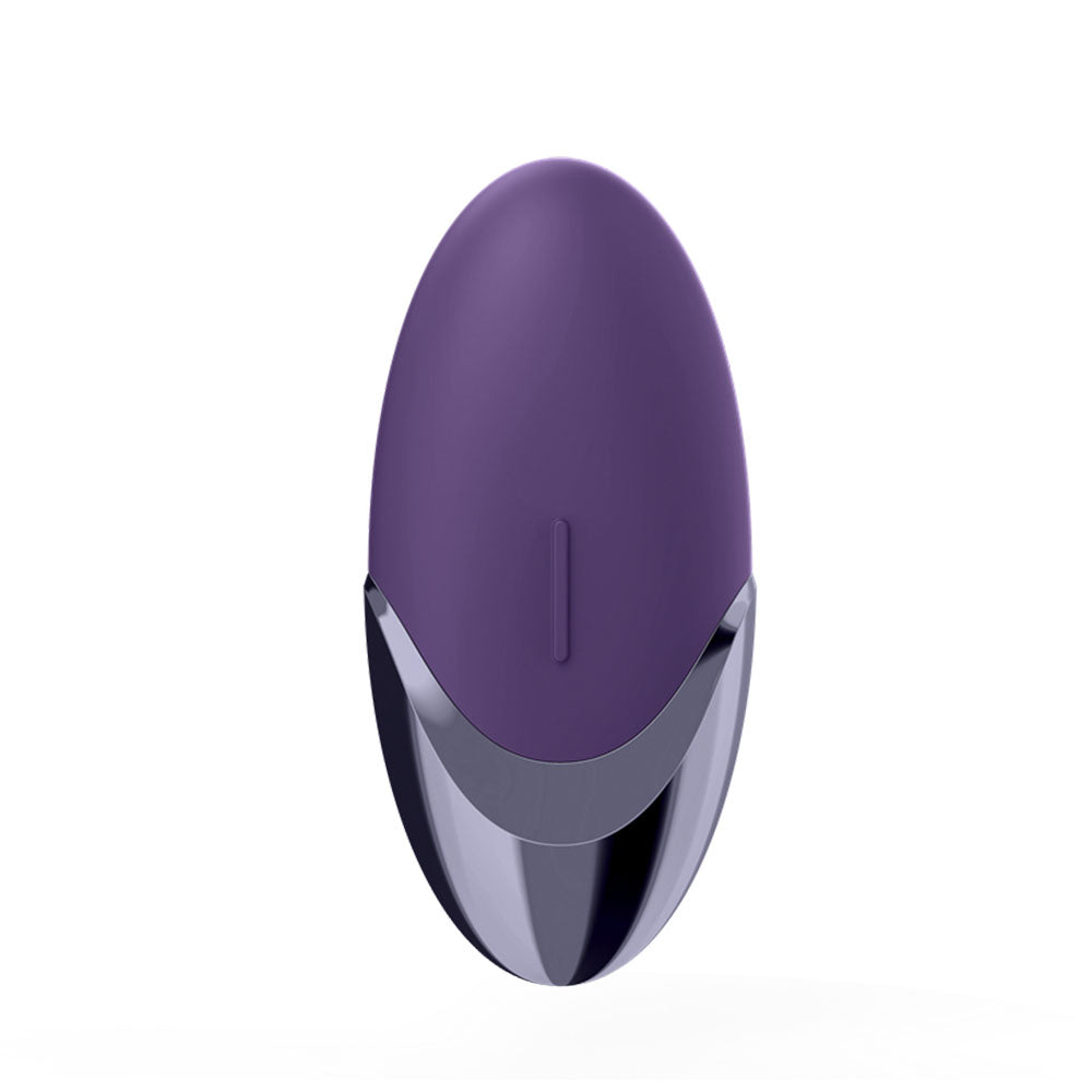 Close-up of a purple clitoral vibrator from Satisfyer, designed for external stimulation.