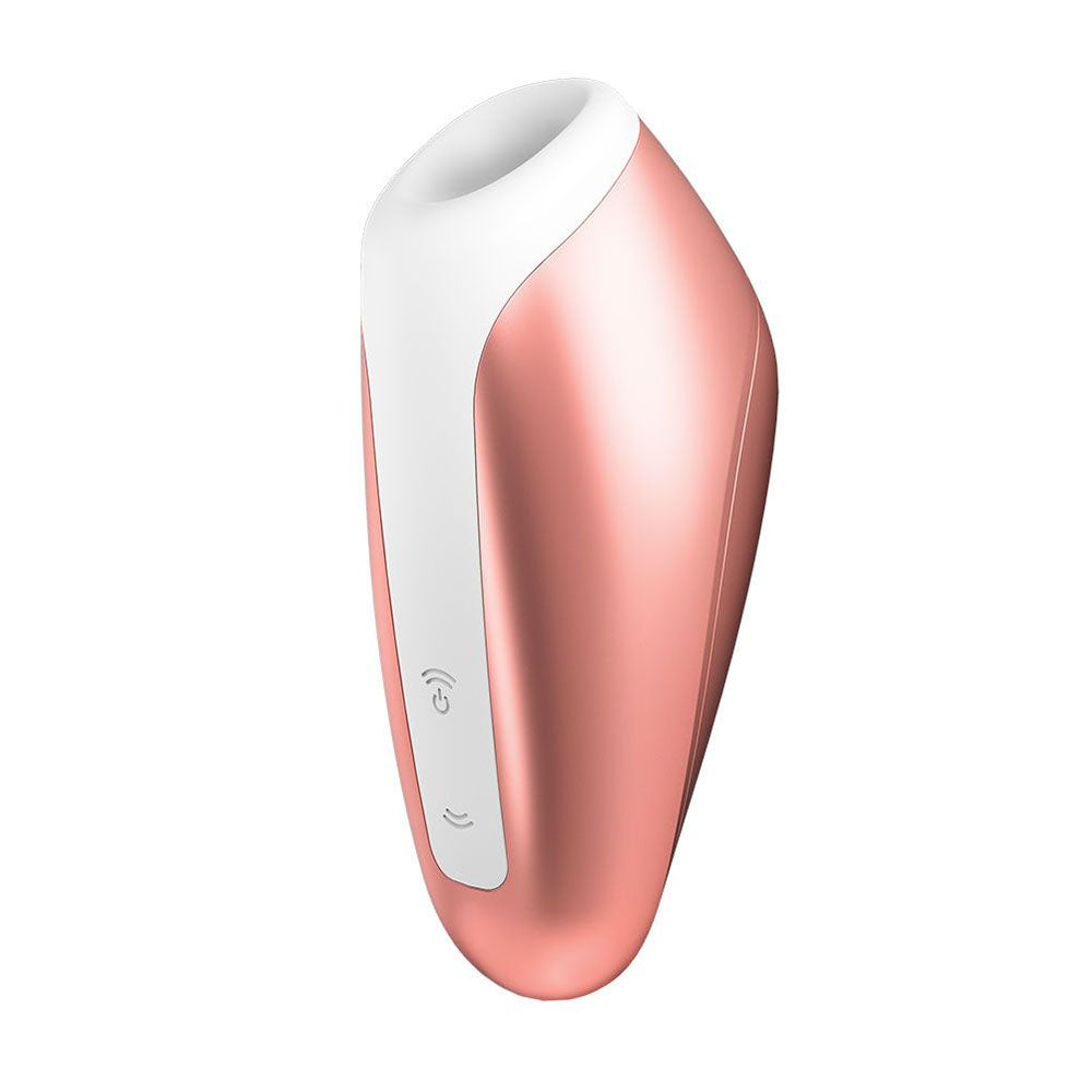 Copper-coloured Satisfyer Pro clitoral massager with a sleek, ergonomic design for gentle stimulation.