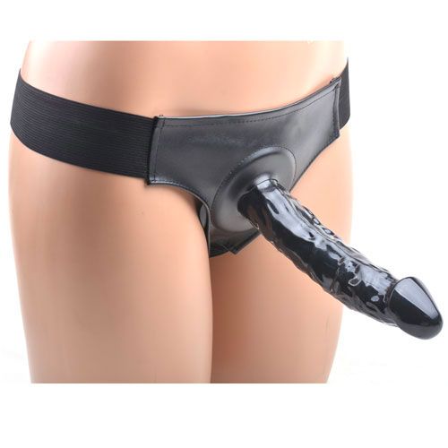 Black strap on dildo with adjustable harness for comfortable and secure fun.