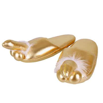 A pair of golden novelty penis slippers, ideal for lounging in outrageous comfort.