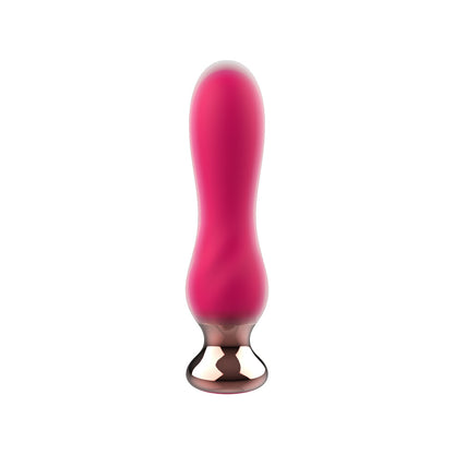 Elegant pink vibrating buttplug with a smooth finish, perfect for anal play and pleasure.