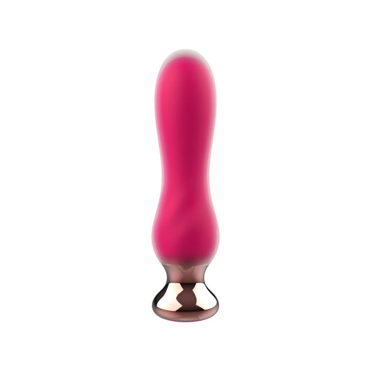 Elegant pink vibrating buttplug with a smooth finish, perfect for anal play and pleasure.