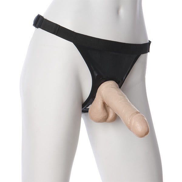 Realistic flesh-toned 6-inch dildo attachment with vac-u-lock suction base for secure use.