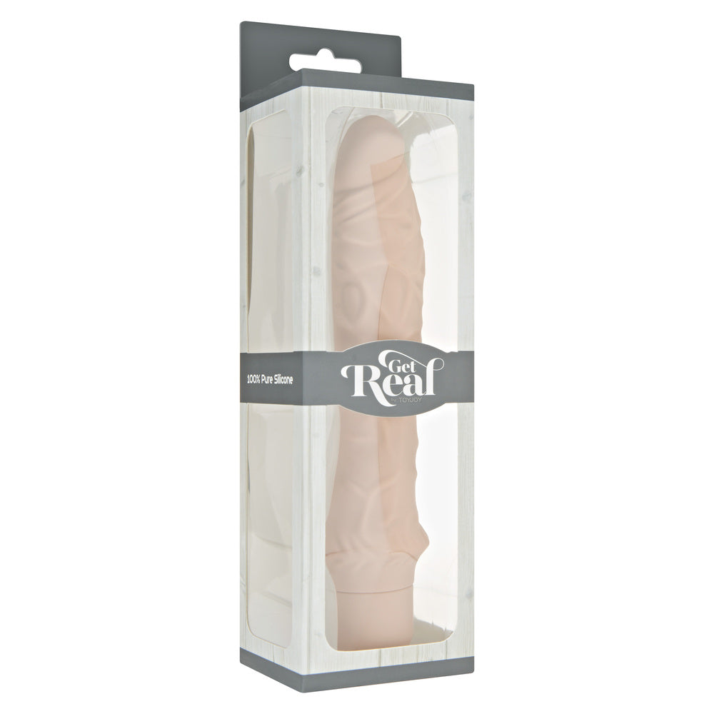 Flesh pink silicone vibrator from ToyJoy, a realistic and classic design for pleasure.
