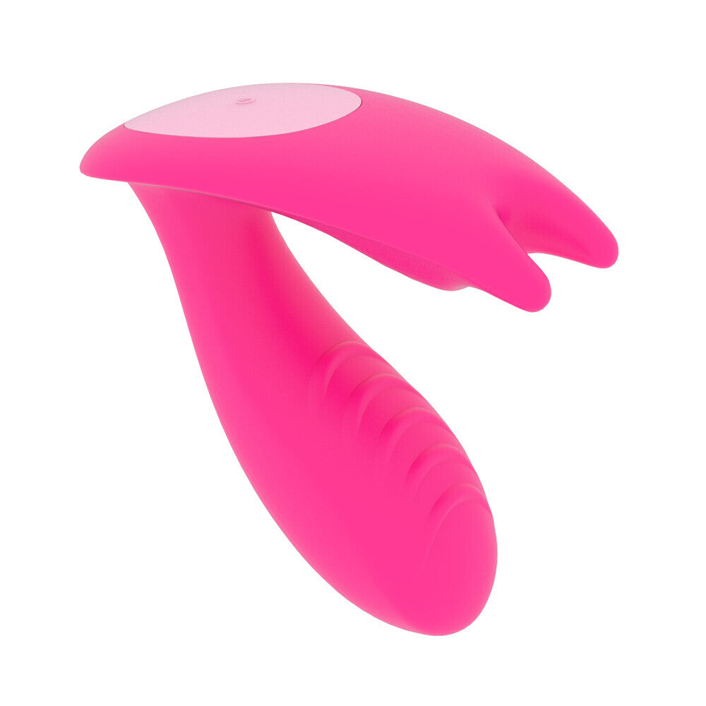 Clitoral vibrator for pleasure, in a dusky pink finish, wearable for discreet use.