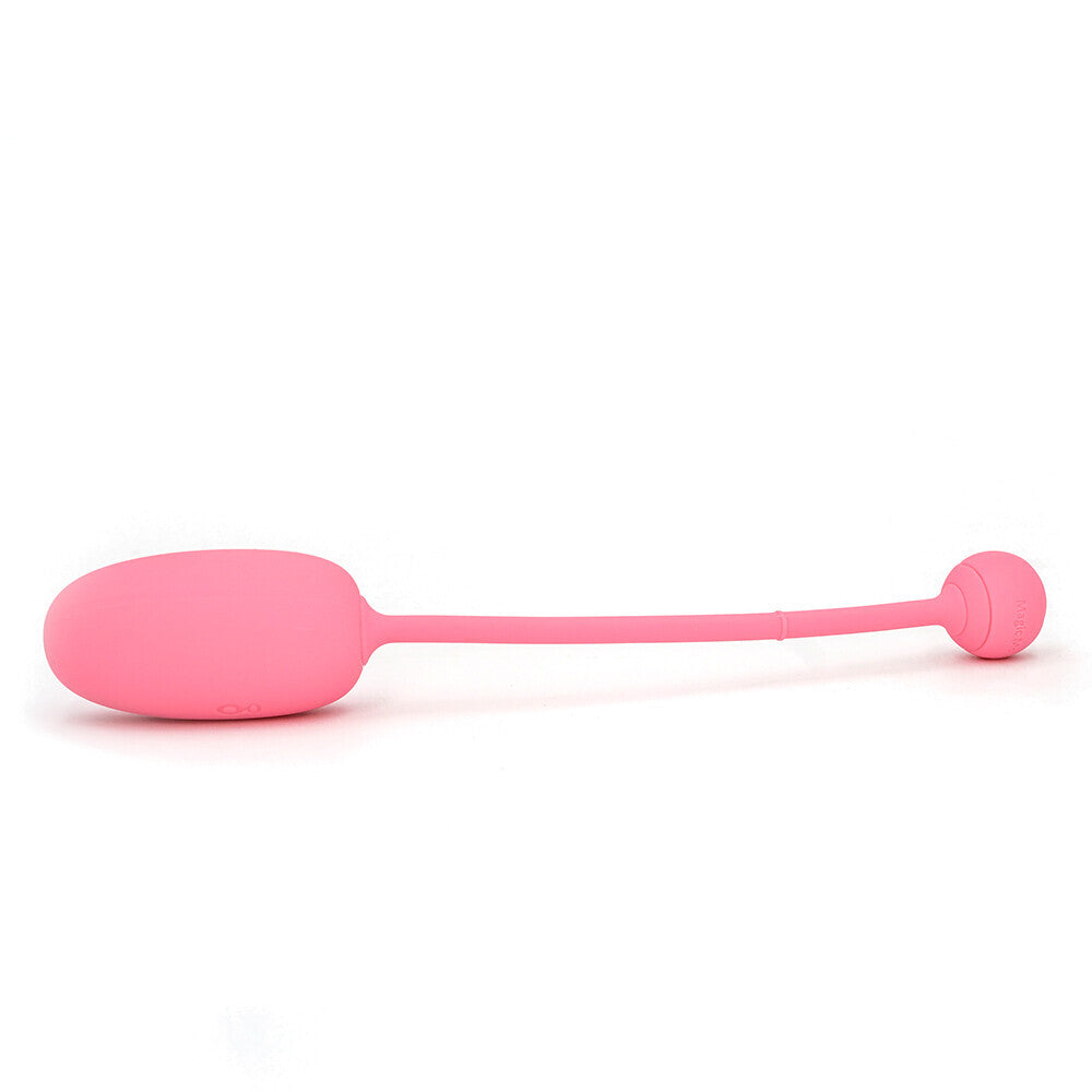 A smooth, rounded kegel coach smart ball in a dusky pink shade for pelvic floor exercise.