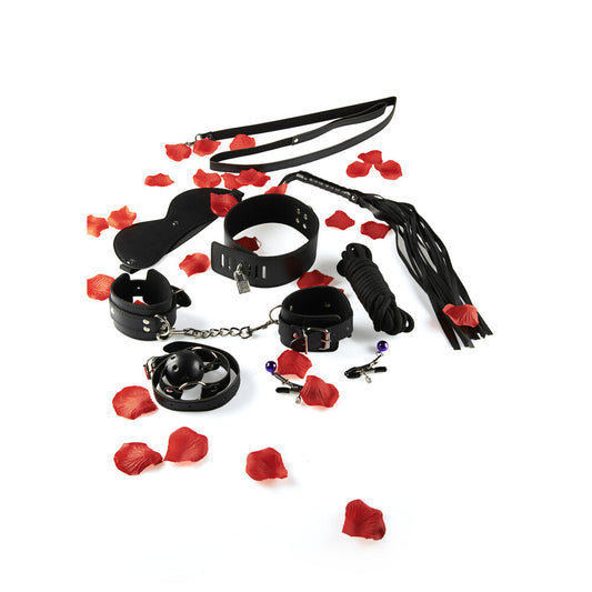 ToyJoy BDSM starter kit with restraints and implements for playful exploration.