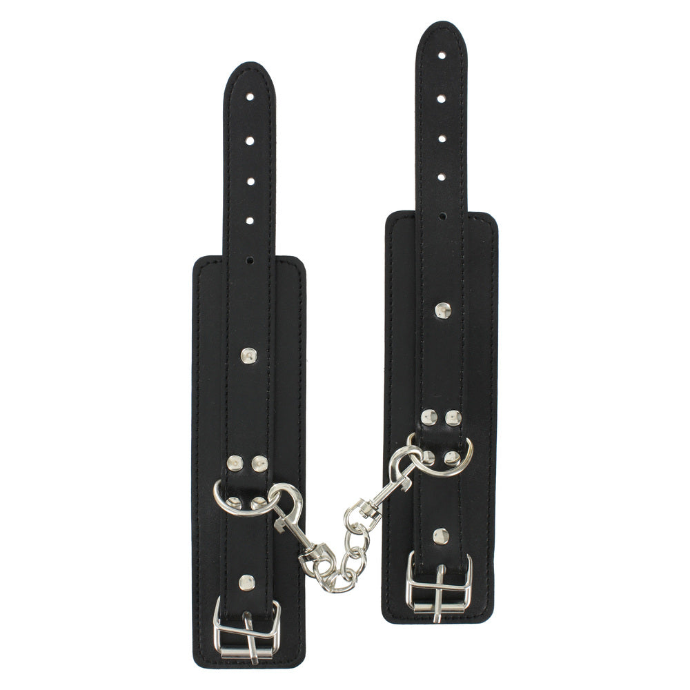 ToyJoy BDSM starter kit with restraints, gag, and flogger for playful bondage.