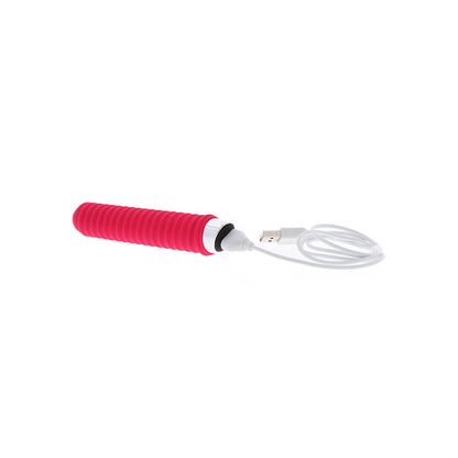 Close-up of a purple, screw-shaped vibrator from toy joy, a standard vibrator.
