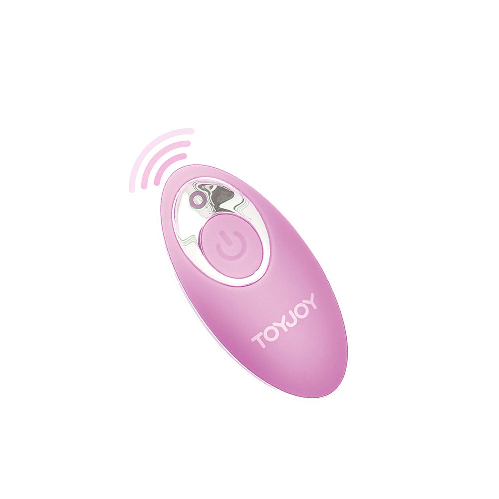 Close-up of a smooth, pale pink ToyJoy vibrating egg sex toy, ready for pleasure.