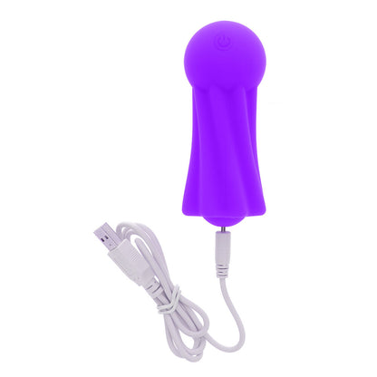 Close-up of a purple, clitoral vibrator with a smooth finish from Toy Joy Sex Toys.